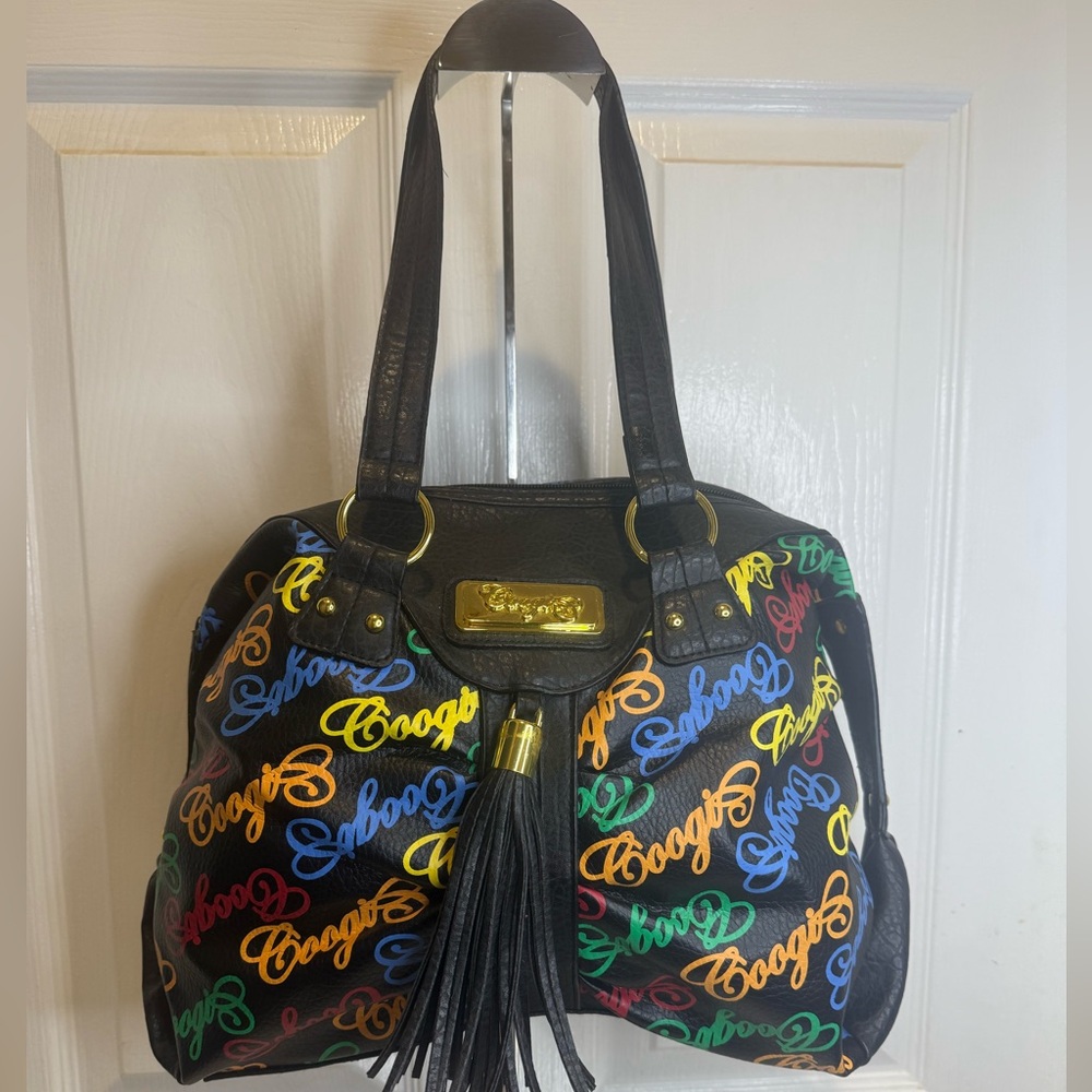 COOGI VINTAGE AUSTRALIAN MONOGRAM BLACK BAG WITH TASSLE